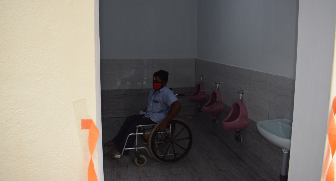 A person in Wheel Chair inside the New Toilet Block